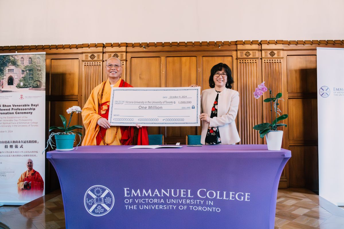 The Venerable Dayi Shi presented Emmanuel College Principal HyeRan Kim-Cragg with a cheque for the first $1 million of the commitment at a reception Wednesday evening at the school.