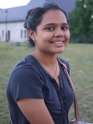 Anishaa Balaji  wearing a blue blouse. 