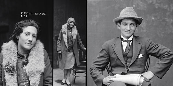 Two black-and-white images featured side by side: A woman in a fur shawl standing next to a chair, and a man, sitting in a chair and holding a newspaper, wearing a suit and top hat.