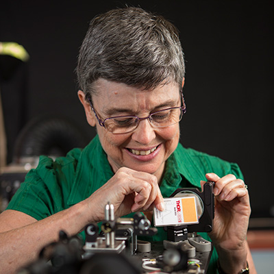 Melanie Campbell working with equipment. 